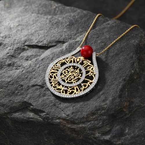 A striking gold-tone pendant featuring an intricate circular design. Its detailed finish gives the piece a luxurious and timeless appearance.