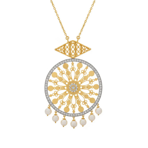 A gold pendant necklace featuring a circular filigree design with a central diamond, a diamond-studded border, and five dangling white pearl beads, shown on a plain white background.