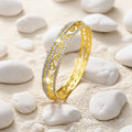 A stylish gold-tone Bracelet with a diamond classic design that complements a variety of looks. A versatile accessory for adding a polished finishing touch.