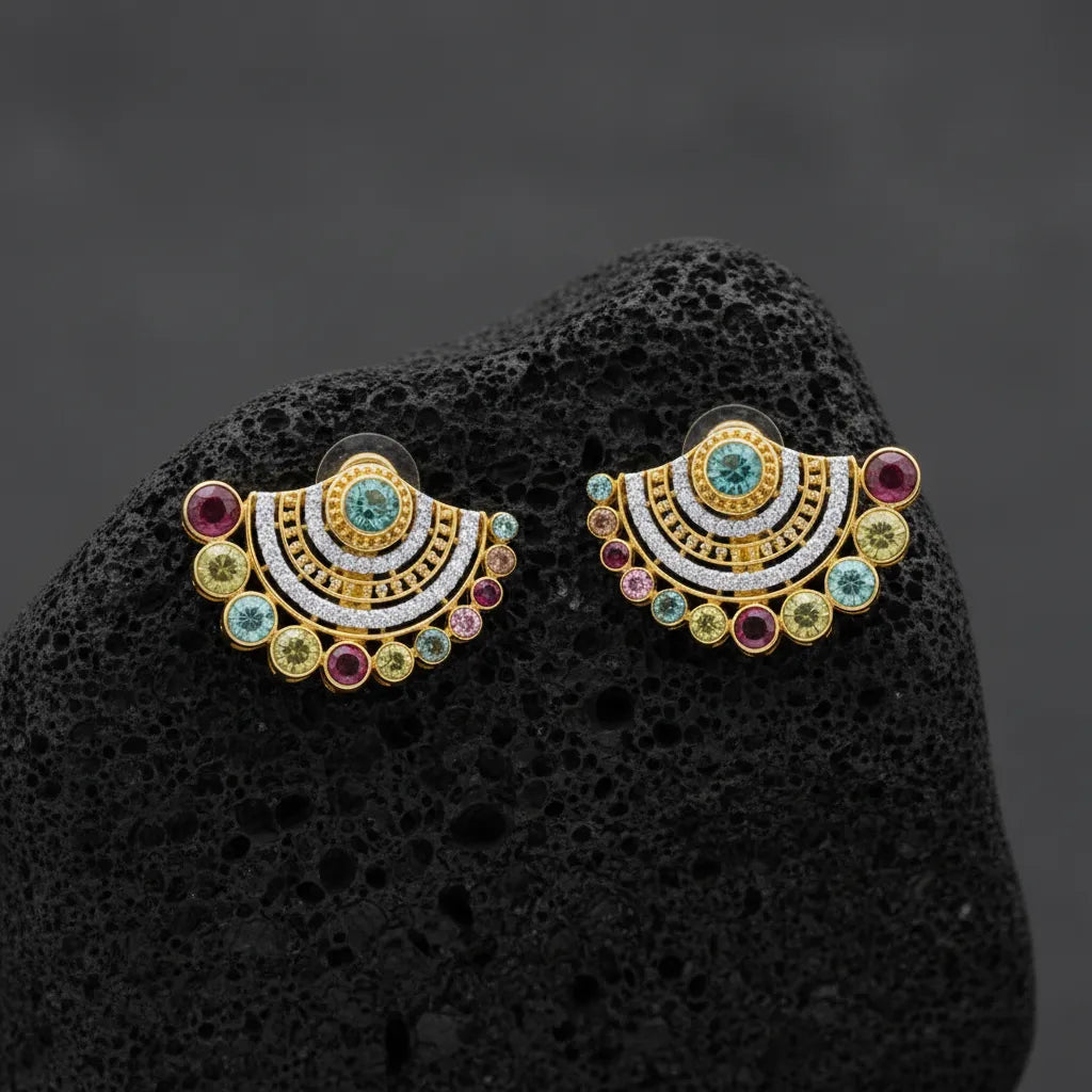 Beautiful floral-inspired earrings with intricate detailing and a refined finish. Designed to add a sophisticated touch to your outfit, whether for a special occasion or an elegant evening look.