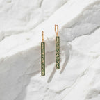 Elegant slim drop earrings designed with a refined, elongated silhouette. Lightweight-looking and sophisticated, they make a beautiful finishing touch for an elegant outfit.