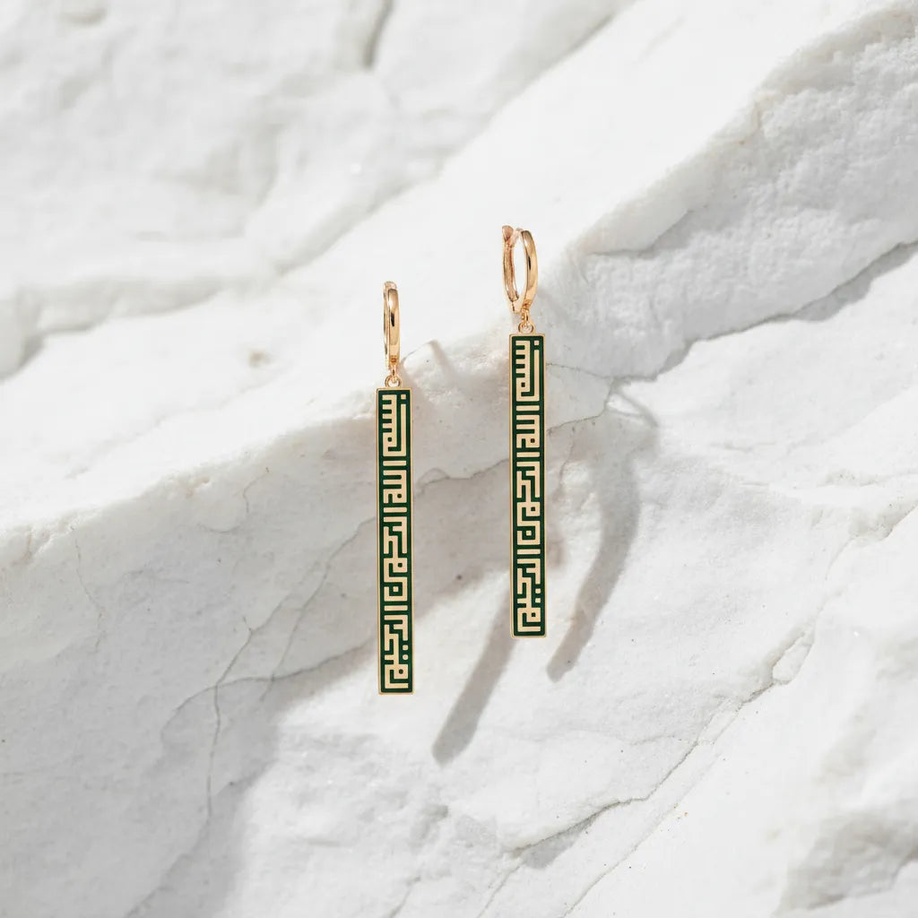 Elegant slim drop earrings designed with a refined, elongated silhouette. Lightweight-looking and sophisticated, they make a beautiful finishing touch for an elegant outfit.