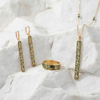 A beautifully coordinated set featuring matching gold-tone jewelry pieces with delicate detailing. A sophisticated choice for creating a complete, polished look.
