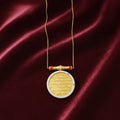 A sleek necklace featuring a classic round pendant. Its minimalist design makes it easy to layer or wear alone for an effortlessly elegant finish.