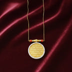 A sleek necklace featuring a classic round pendant. Its minimalist design makes it easy to layer or wear alone for an effortlessly elegant finish.