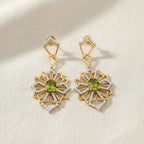 Beautiful earrings featuring intricate floral-inspired details. Their graceful design adds movement, sparkle, and feminine elegance to any occasion look.